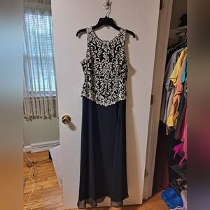 Size 12. Beautifully detailed formal dress.